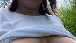 Mature mom moves her assets in public park