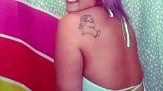 suzie milf strips to reveal big boobs