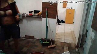 Stella Still shows off her big tits in the kitchen