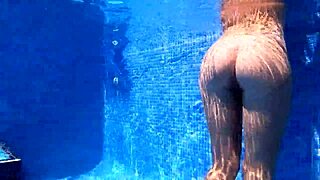 exuberant milf bent over for doggystyle under water