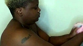 Ebony bath time turns into wet fingering and massage fetish