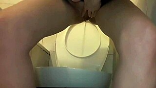 Experiencing extreme pissing and intense squirt orgasm during solo masturbation.