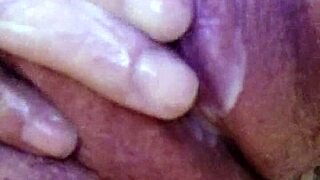 Latina milf masturbates pussy to orgasm with handjob close up