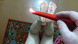 Easy domination with tickling and wax on bare feet homemade foot fetish of a mature couple