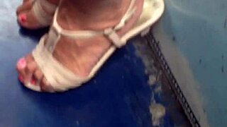 Mature beauty flaunts her stunning feet in solo play.