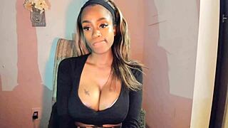 tattooed ebony milf teases with her big tits