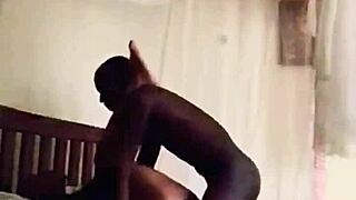 Her black pussy gets filled and her big black cock is stuffed down her mouth