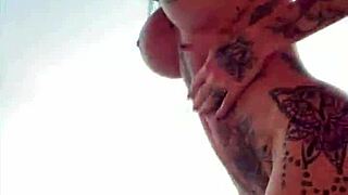 Dancing naked in sauna, milf shows off big tits for amateurs