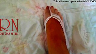 White Socks Cute Chick Lies On Bed Smiles Gracefully Bends