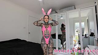 Melody Radford’s pink leather micro bikini and bunny ears seductive try on