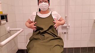 Chubby asian milf with big tits masturbates lewdly in a store toilet selfie