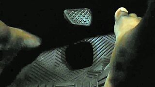 Driver touches gas pedal with bare toes in specific moment.