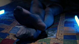 New mommy gets to show off her feet in fishnets