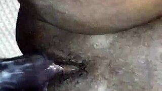 two big black cocks double penetrate a busty milf