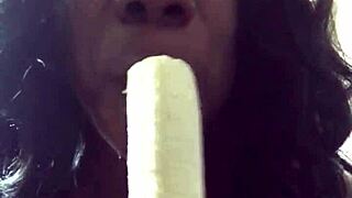 Banana getting a deepthroat from an African American mature woman