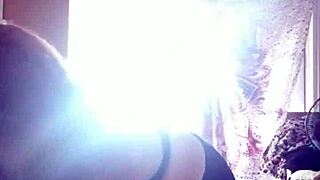 She puts the lotion on her sexy skin