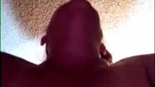 A mature woman undresses and uses a suction cup dildo to pleur