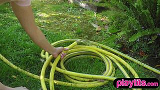 Old Swiss MILF undressing in the garden for you