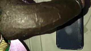 Ebony lover cums from big cock.