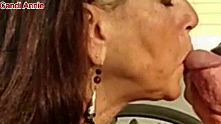 Close up of a mature woman's face while she gives a blowjob and swallows cum
