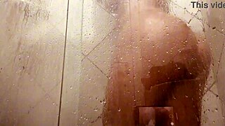 Mature Milf with Big Tits Films Washing Her Hairy Pussy in Bathroom
