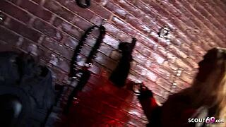 Slave endures femdom threesome with domina in dark dungeon sex