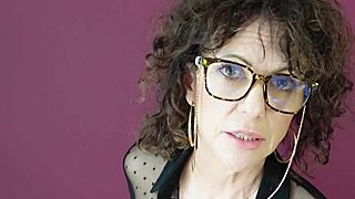 Beautiful curly-haired amateur MILF in solo action
