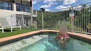 wife casually flashing her big tits in the hotel pool daring everyone