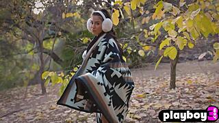 Attractive big tits babe teases with sexy striptease outdoors