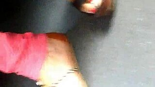 mature feet captured candidly in wedges sandals