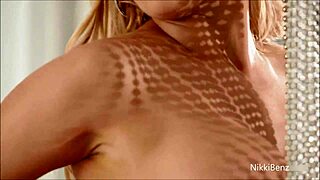 Nikki Benz is a busty blonde and she performs provocative dance moves