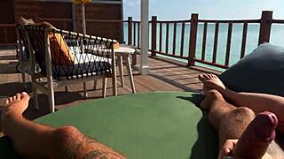 Hot blonde babe gives sloppy handjob with stunning view