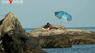 Tanned beauty gets fucked on naked beach