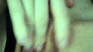 russian milf rubs her wet shaved pussy close up