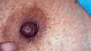 Desi girl flaunts big boobs with nipple close-up action.