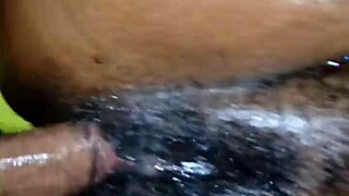 Feeling the intense pleasure as her oily wet pussy gets oiled and orgasms