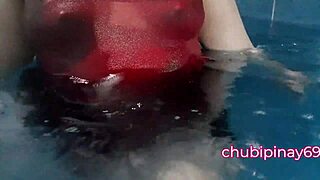 Asian milf flashes big natural tits at public pool