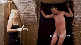 Cruel Blonde Milf Whips Guy's Cock in Brutal Session