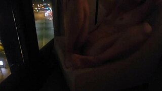 Masturbating in public by hotel window feels insanely wild!