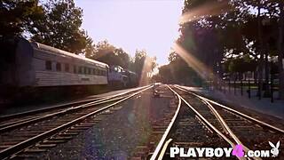 Jaime Edmondson, sexy redhead milf, poses naked outdoors.