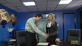 Blonde milf with big tits gets fucked by boss. She rides hard in office stockings.
