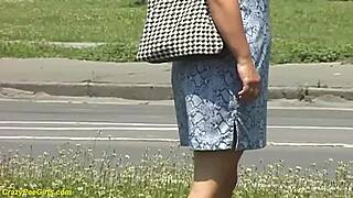 Redhead BBW milf caught peeing in public spot