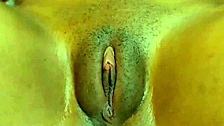 Cute Jamaican girl rubs her fat cameltoe pussy for fun.