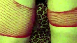 sexy milf with tattoos shakes ass outdoors in fishnets