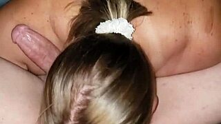 this milf with big nipples is sucking on a cock while showing her ass