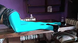 milf with gorgeous legs in pantyhose and heels lounging on the desk