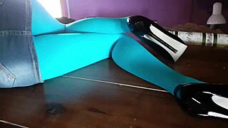 milf with gorgeous legs in pantyhose and heels lounging on the desk