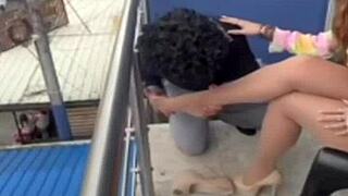 Pierced woman in pantyhose with milf allure.