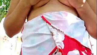 Blonde milf steps outside to masturbate and show hairy natural tits.