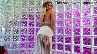 sassy blondie natalia starr undresses in a softcore scene